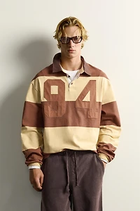 STRIPED NUMBER PATCH POLO