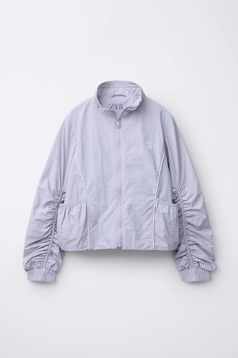 NYLON JACKET WITH CONTRAST PIPING