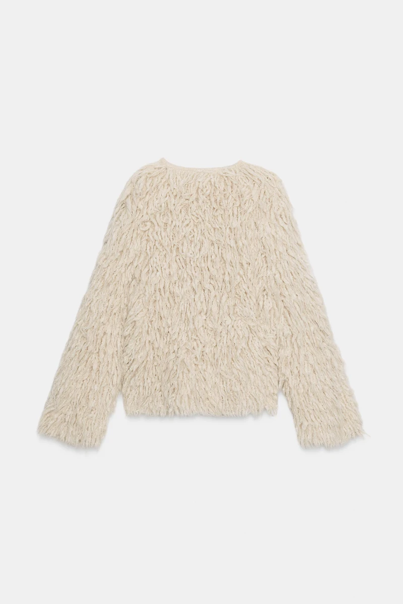 GILET EN MAILLE À FRANGES EFFET BROSSÉ