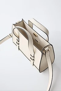 BINDING CROSSBODY BAG