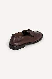 CHAUSSURES EN CUIR