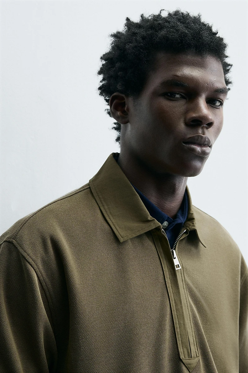 POLO DÉLAVÉ EN PIQUÉ STRUCTURÉ