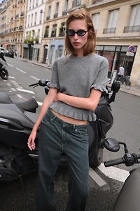 RUFFLED SHORT SLEEVE KNIT SWEATER
