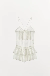 ROBE COURTE À NŒUDS ET VOLANTS