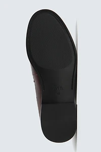 WORN PENNY LOAFERS