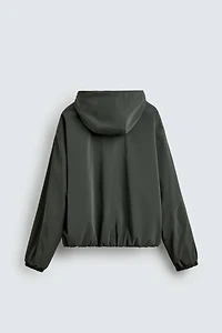 VESTE TECHNIQUE À CAPUCHE