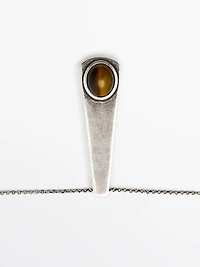 Geometric pendant with stone