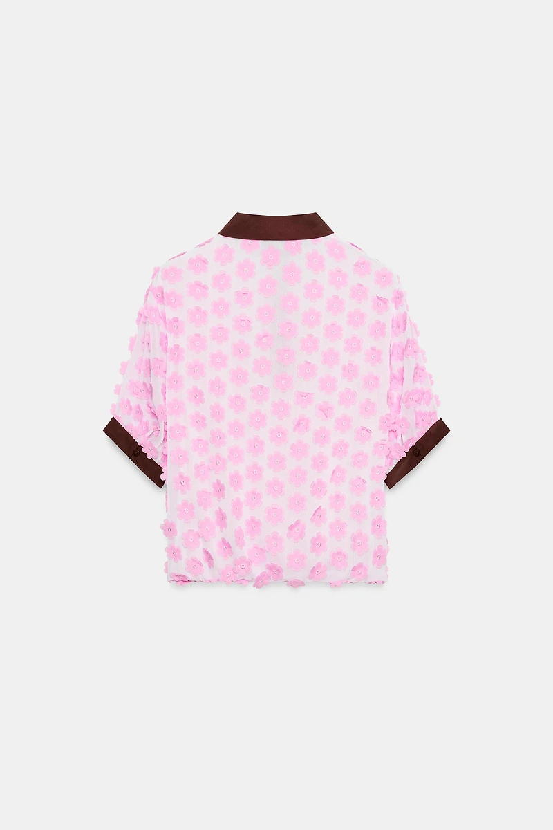 BLOUSE STRUCTURÉE À FLEURS