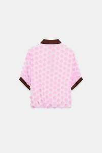 BLOUSE STRUCTURÉE À FLEURS