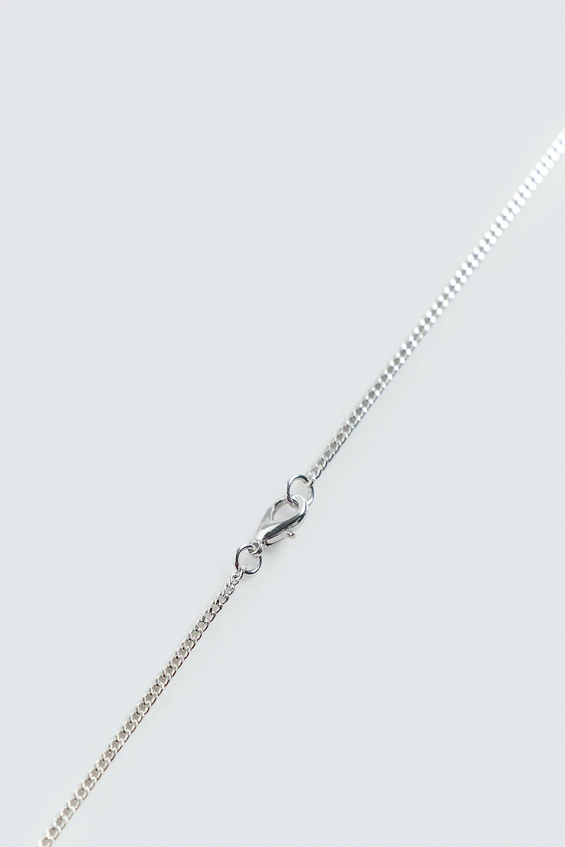 CONTRAST PENDANT NECKLACE