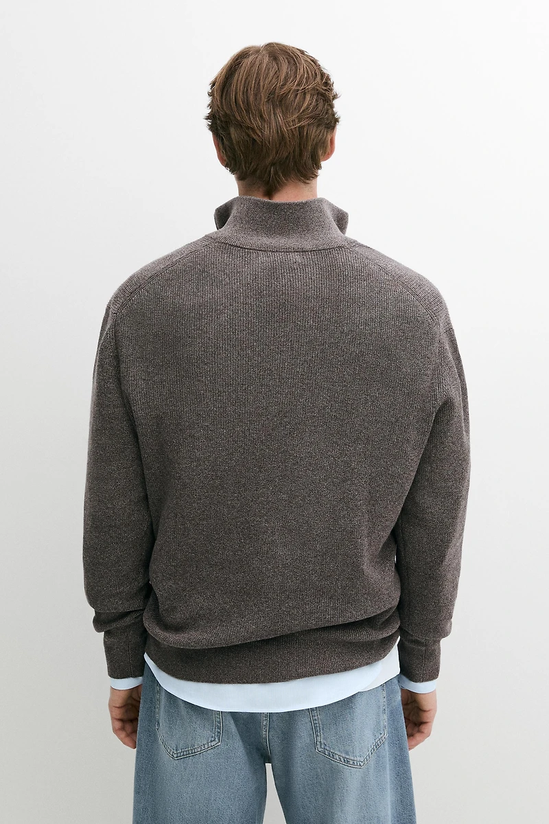 Pull en maille à col camionneur zippé