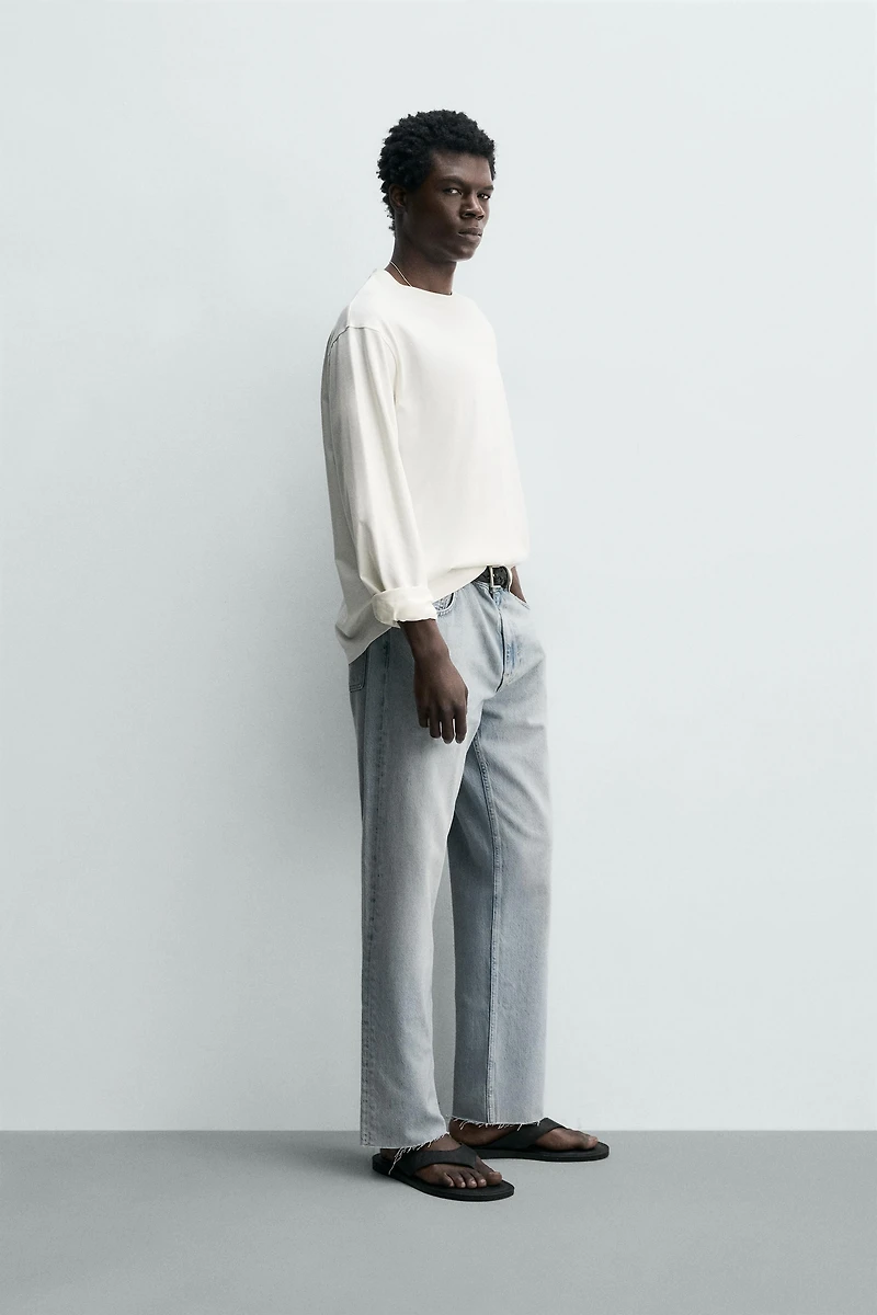 IRREGULAR HEM STRAIGHT FIT JEANS