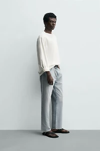 IRREGULAR HEM STRAIGHT FIT JEANS