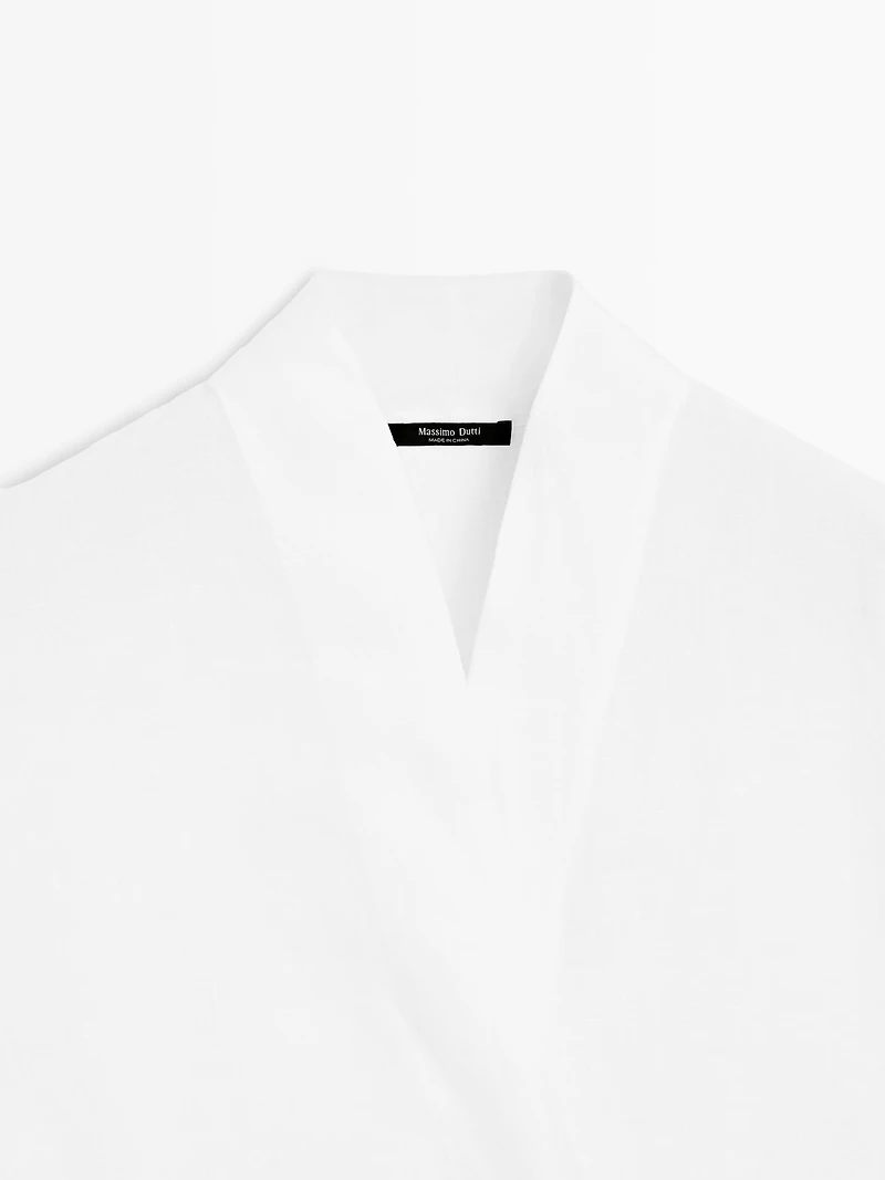 Flowing linen blouse with surplice neckline