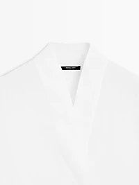 Flowing linen blouse with surplice neckline