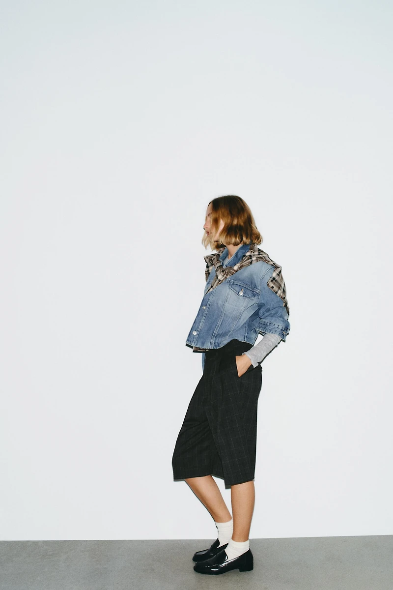 LONG PLAID PLEATED SHORTS