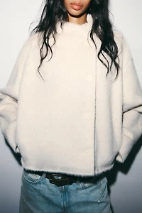 BLOUSON EFFET FOURRURE CROISÉ