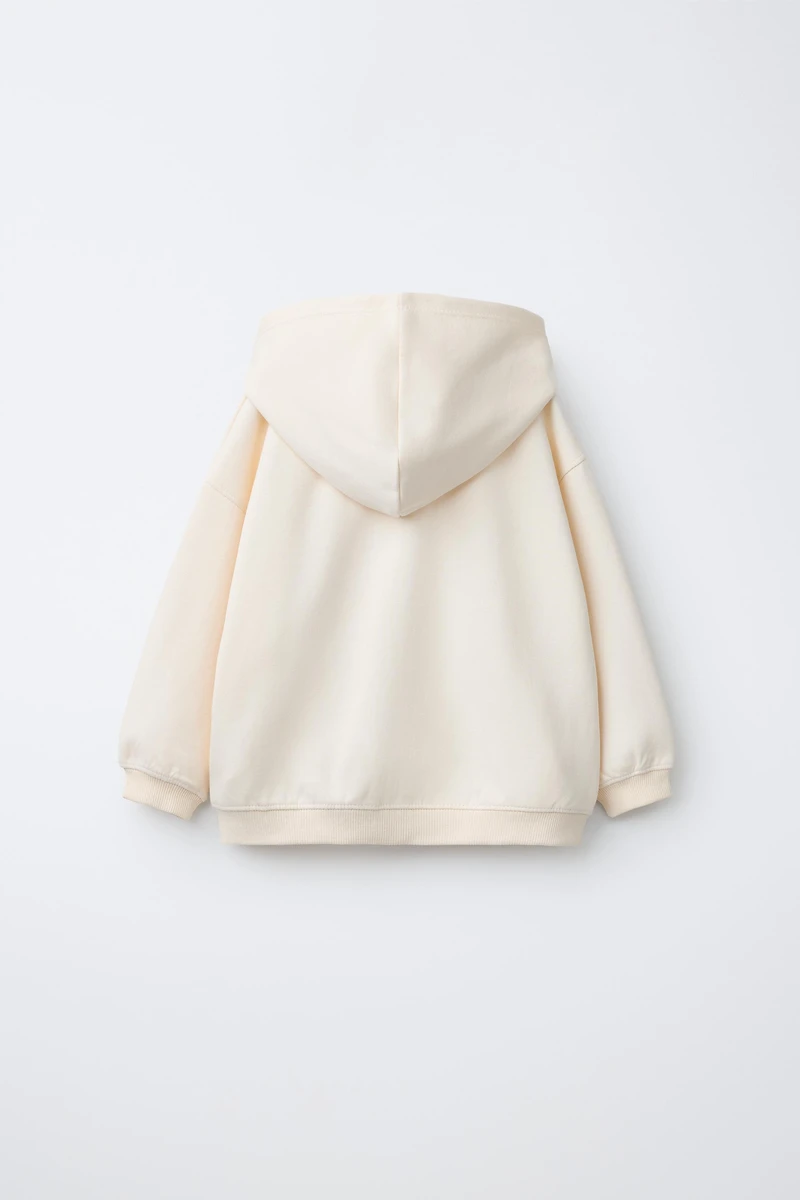 INTERLOCK ZIP SWEATSHIRT WITH RAISED TEXT