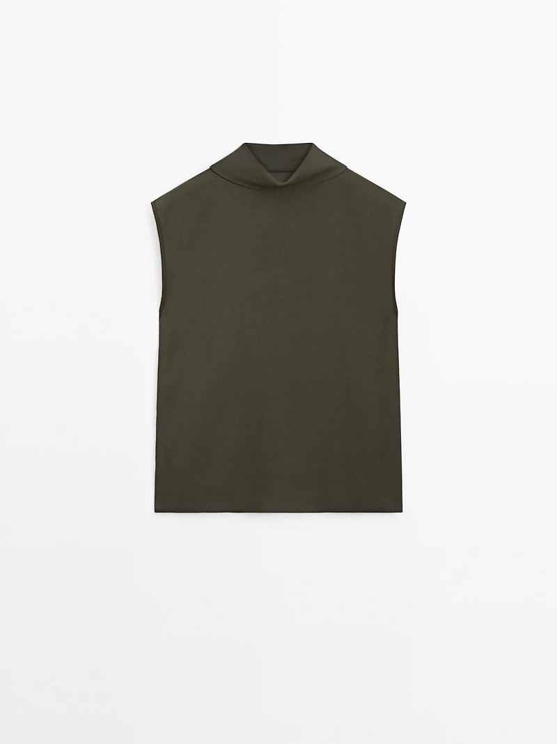 Flowing blouse with draped neck detail