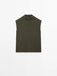 Flowing blouse with draped neck detail