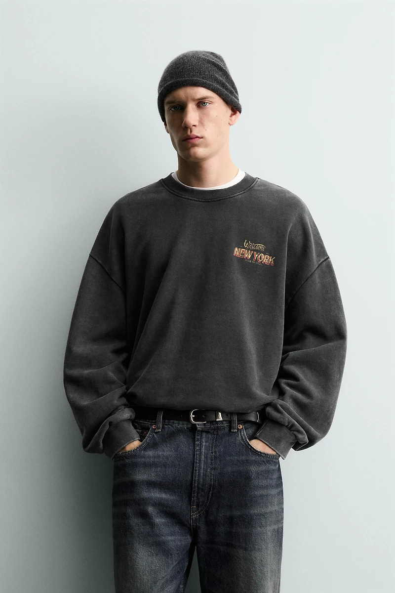 WASHED PRINTED TEXT SWEATSHIRT