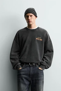 WASHED PRINTED TEXT SWEATSHIRT