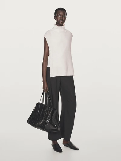 Sleeveless high neck sweater