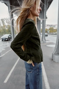 BLOUSON 100% CUIR À BASE ÉVASÉE