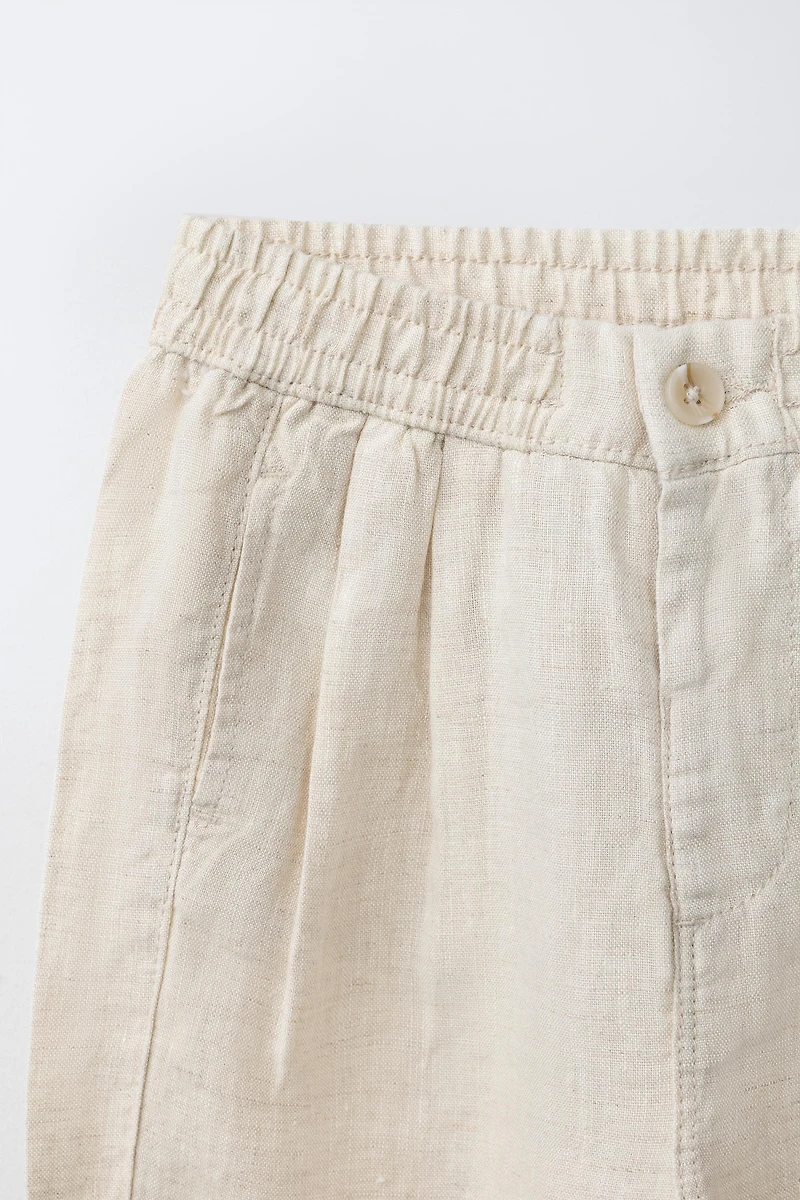PANTALON À PINCES 100% LIN