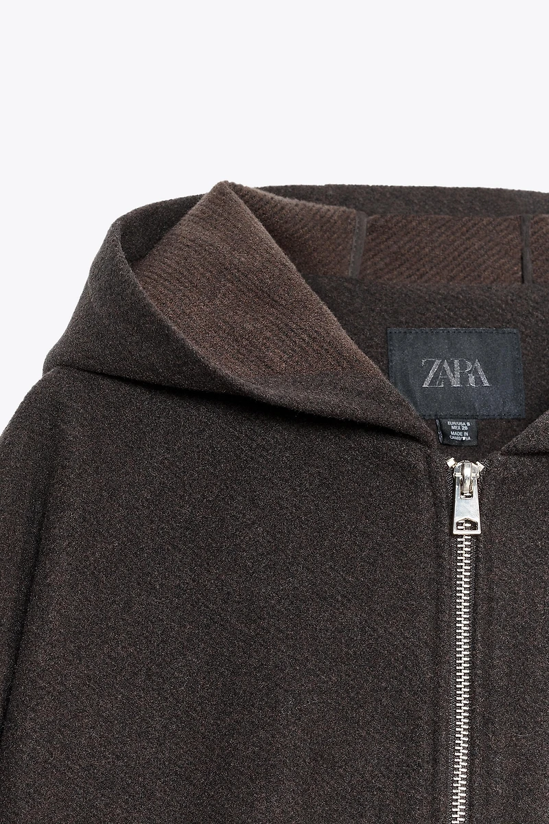 BLOUSON À CAPUCHE ET BAS ÉLASTIQUE