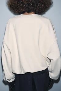 EMBROIDERED BALLOON TEXT SWEATSHIRT