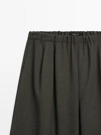 Wide-leg trousers with darts and elasticated waistband