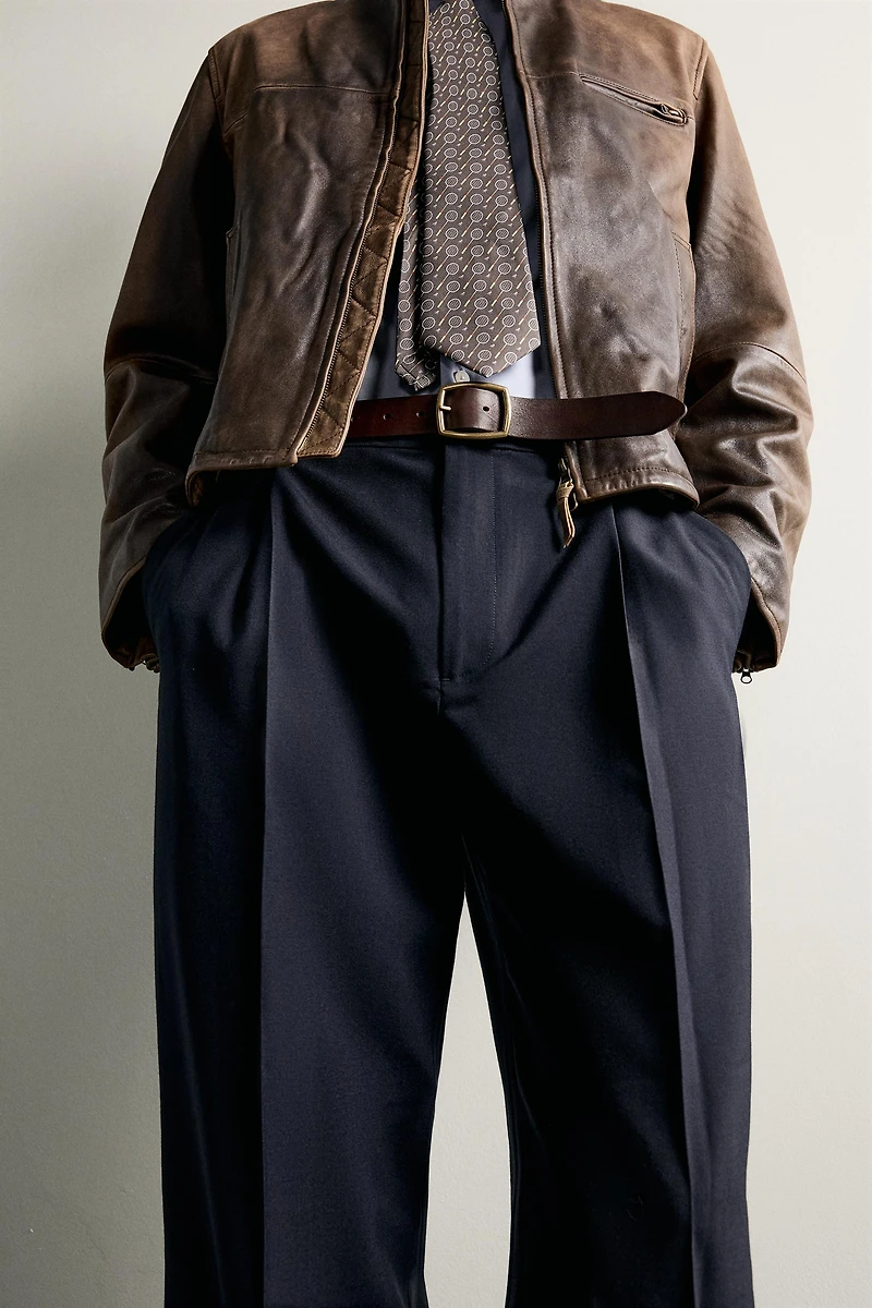 RELAXED FIT PLEATED PANTS