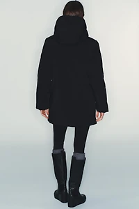 VESTE REMBOURRÉE À CAPUCHE DÉPERLANTE COUPE-VENT