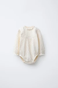 LACE TEXTURED BODYSUIT