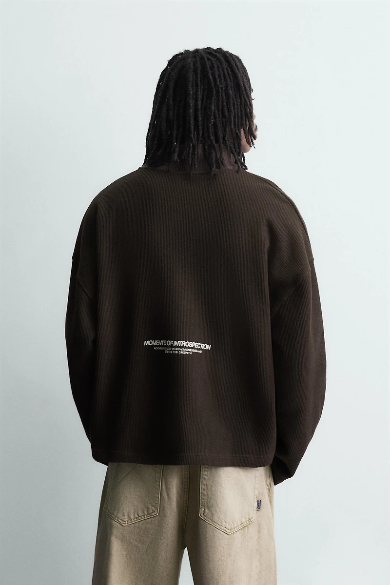 PRINTED QUARTER-ZIP SWEATSHIRT