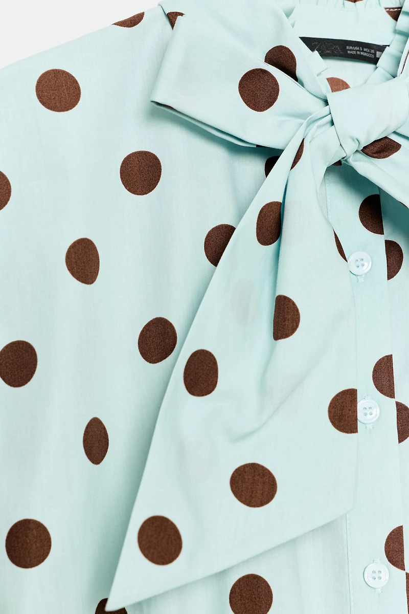 SLEEVELESS POLKA DOT BOW SHIRT