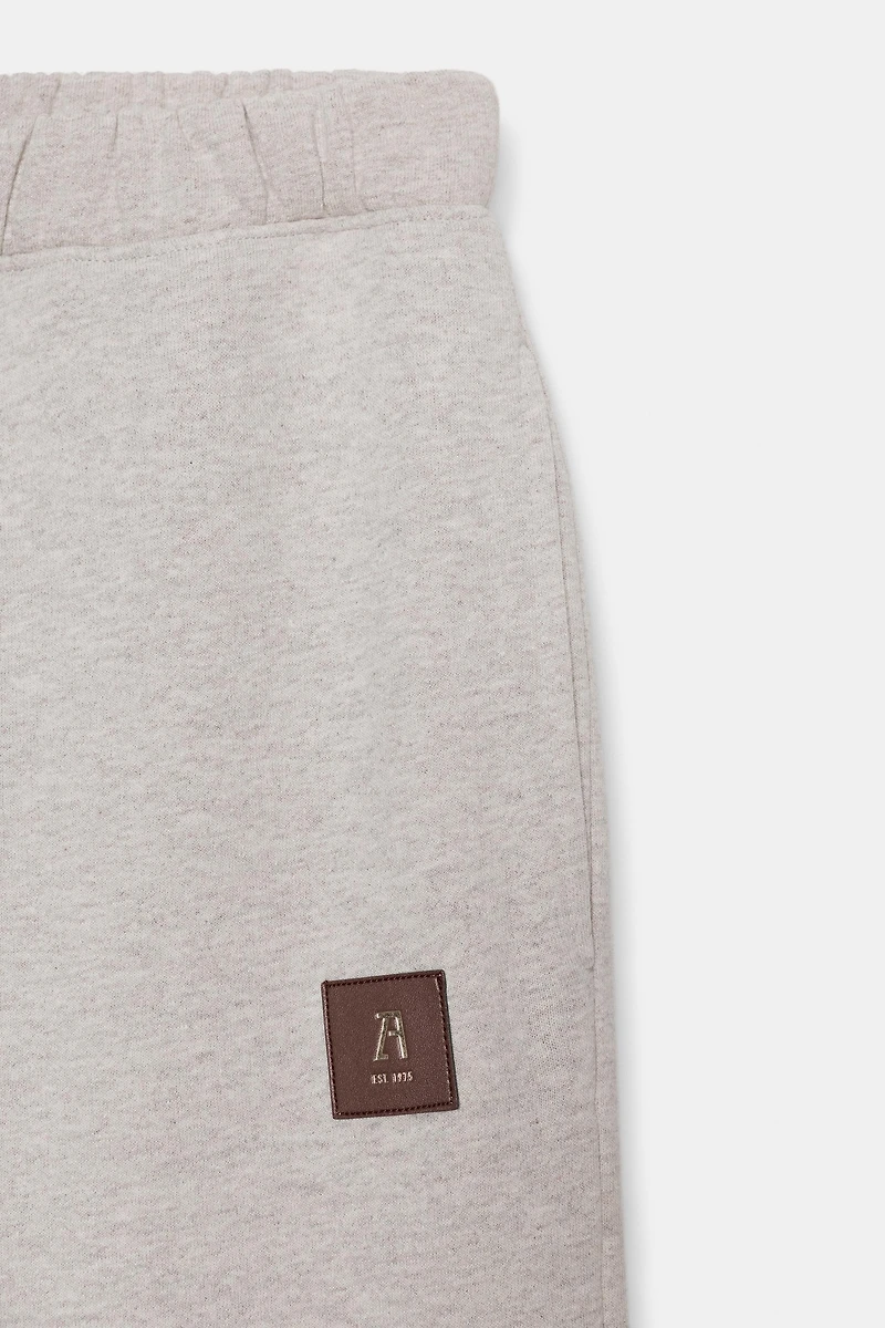PANTALON MOLLETON ÉTIQUETTE