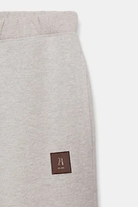 PANTALON MOLLETON ÉTIQUETTE