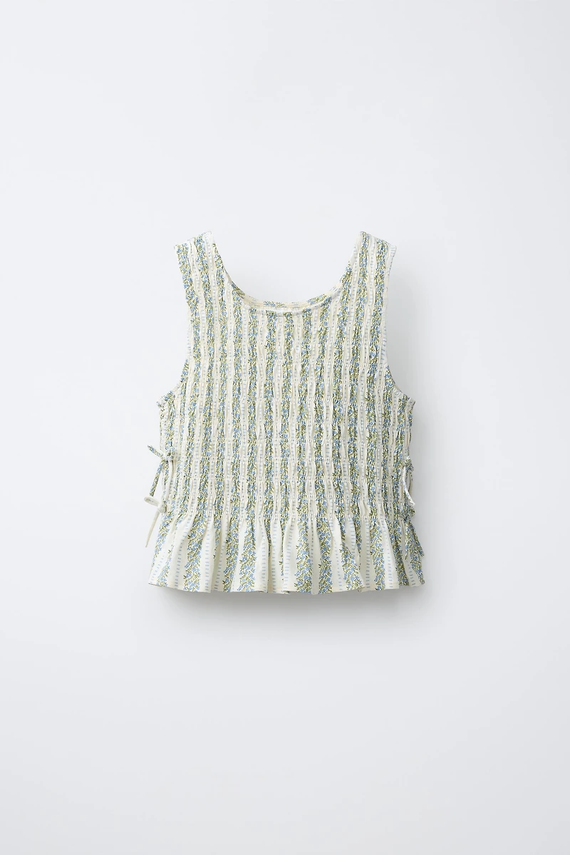 ELASTICIZED TIE TOP