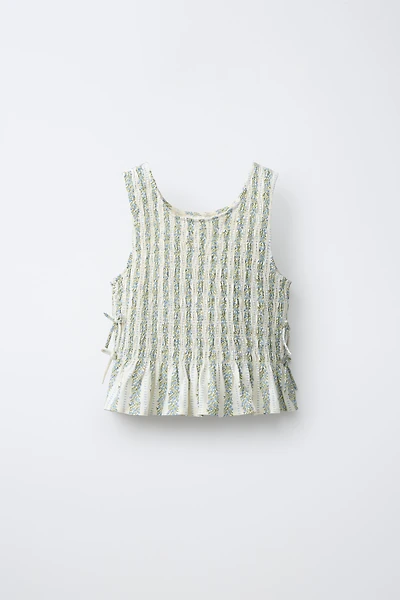 ELASTICIZED TIE TOP