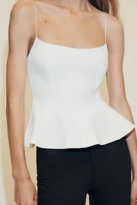 STRETCH PEPLUM TOP