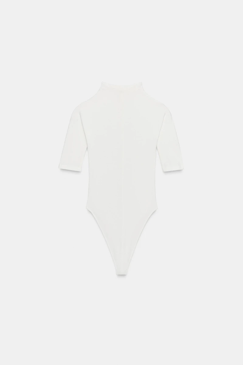 BODY RUSTIQUE À COL MONTANT