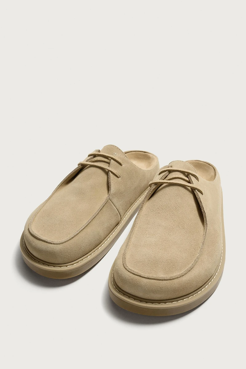 SABOTS EN CUIR