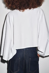 T-SHIRT CAPE