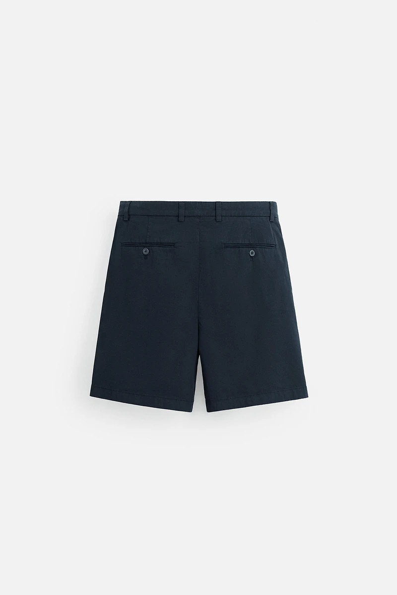 REGULAR FIT PLEATED BERMUDA SHORTS