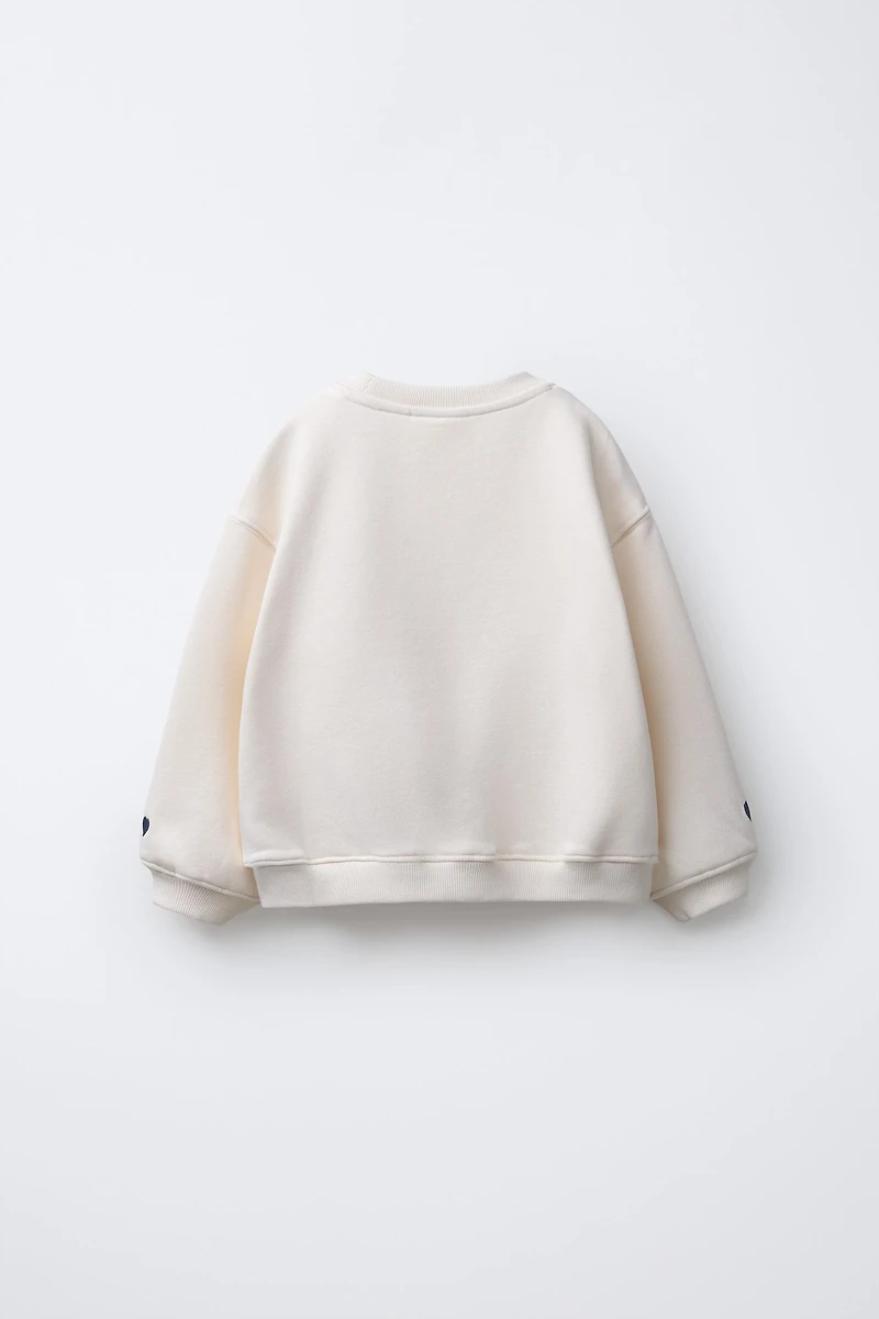 EMBROIDERED CAPYBARA AND HEART SWEATSHIRT