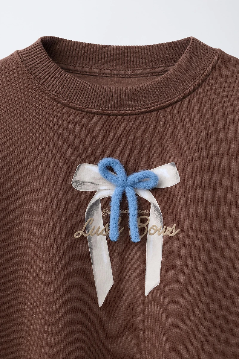 BOW TEXT SWEATSHIRT