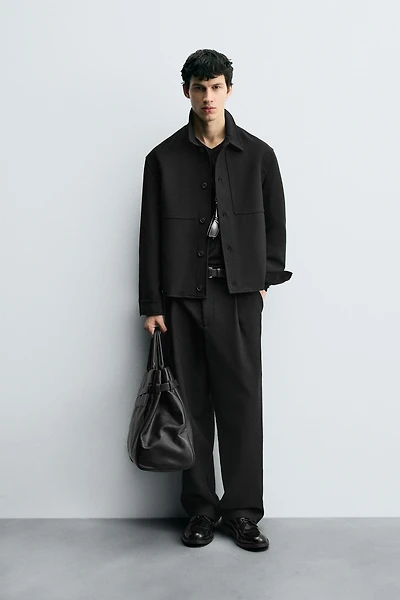 RELAXED FIT PLEATED PANTS