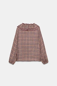 BLOUSE À CARREAUX ET VOLANTS
